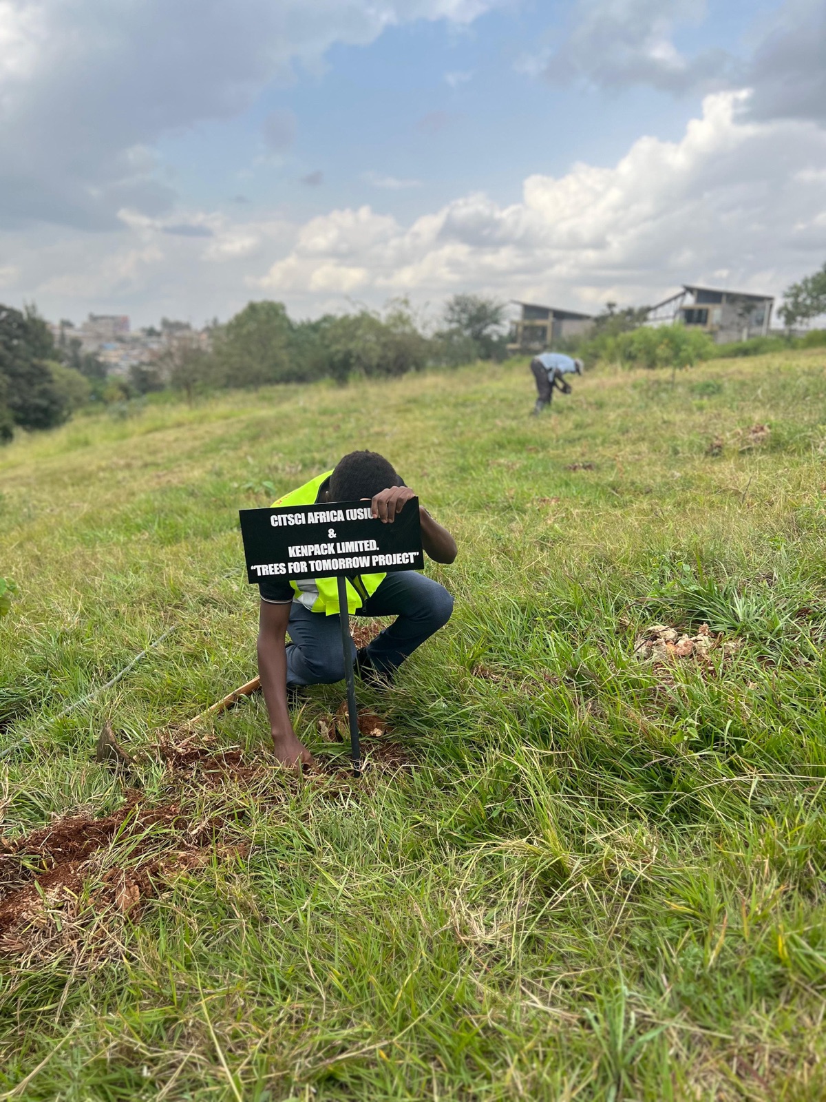 Kenpack staff planting a tree as part of its renewable packaging promise
