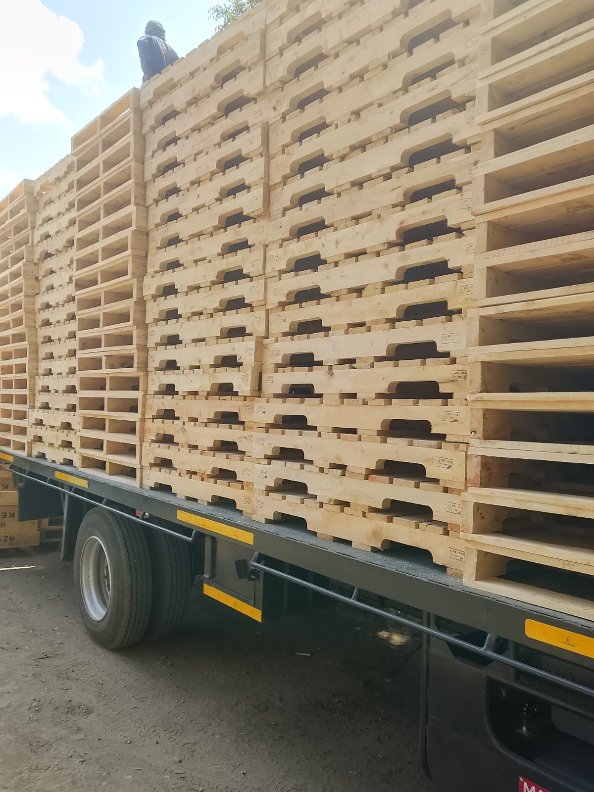 A truck loaded with Kenpack wooden pallets, ready for export dispatch in Kenya